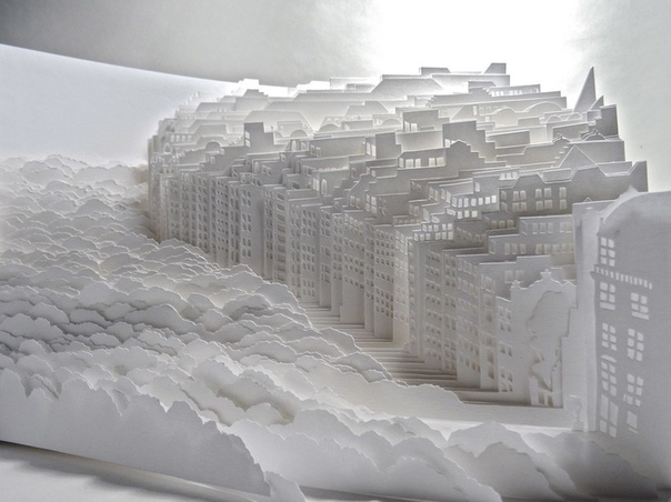 Художница создает потрясающие белоснежные города из бумаги Художница Аюми Шибата практикует японское искусство резки бумаги для создания многослойных трехмерных скульптур. Используя десятки (а